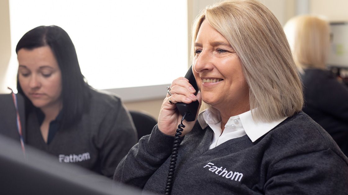 Discussing financial investment performance with the Fathom team